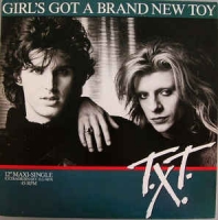 T.X.T. - Girl's got a brand new toy